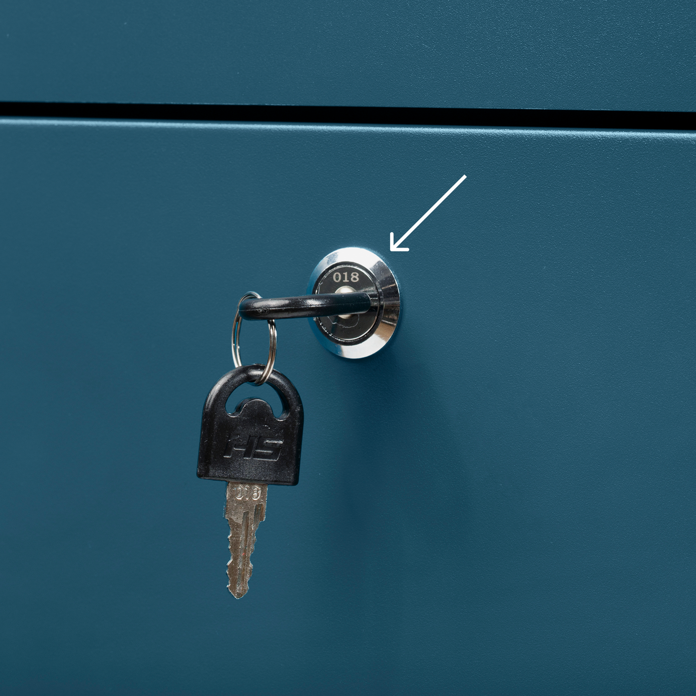 Diagram showing the location of the 3 to 4 digit key number stamped near the keyhole on an Adoorn lock cylinder