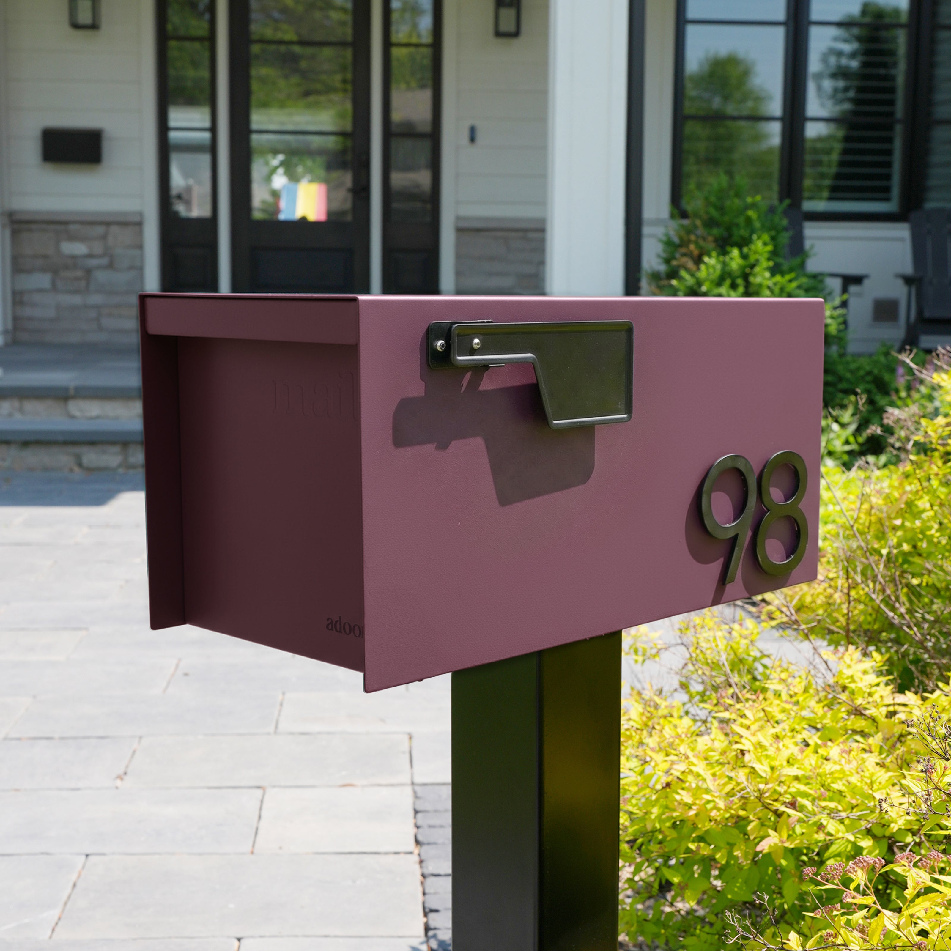 Malbec post mount mailbox in a neighborhood setting